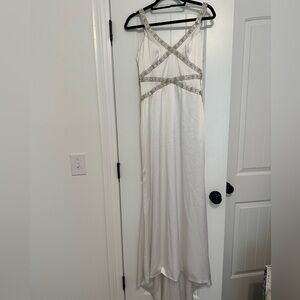 2 beautiful wedding dresses. 1 worn for an hour and the other I never wore.